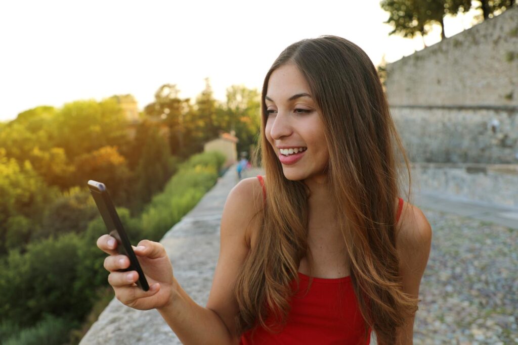 woman sending text messages